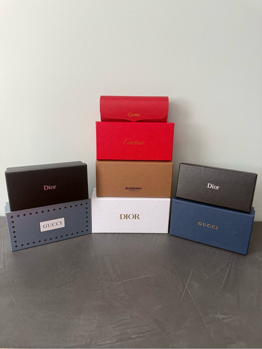 Eyewear boxes and cases.No glasses included.